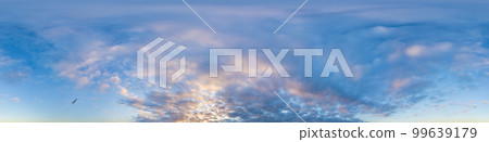Dark blue sunset sky panorama with Cumulus clouds. Seamless hdr pano in spherical equirectangular format. Complete zenith for 3D visualization, game and sky replacement for aerial drone 360 panoramas. 99639179