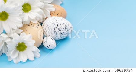Easter eggs and flower bouquet 99639754