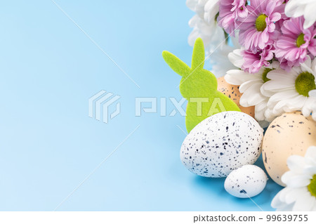 Easter eggs and flower bouquet Easter eggs and flower bouquet 99639755