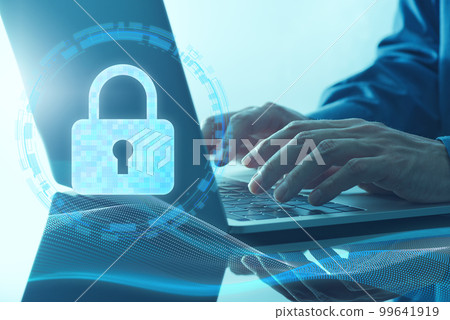 計算機安全系統的圖像。使用掛鎖圖標和筆記本電腦的手的特寫。 99641919