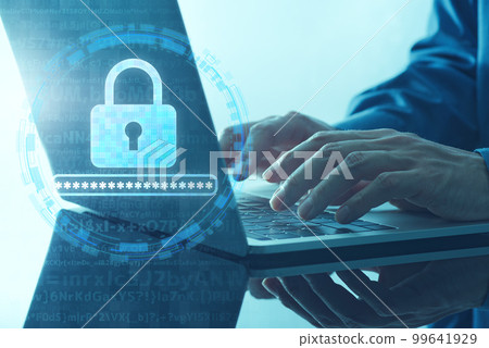An image of a secure password and encryption. Close up of hand using padlock icon and laptop. 99641929