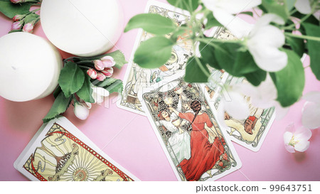 Tarot cards Summer layout on table. Esoteric and forecasting, Three of cups 99643751
