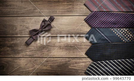Men's necktie on Brown wooden background. Boss day, valentine's day 99643770