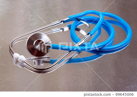stethoscope on a dark background. heart rate medical instrument 99645006