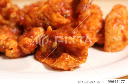 Fried Pork Skins With Red Salsa in Rustic Kitchen Fried Pork Skins With Red Salsa in Rustic Kitchen 99645477