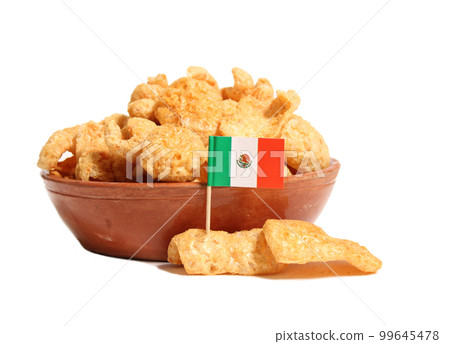 Bowl of Fried Pork Skins With Flag of Mexico Isolated on White Background 99645478