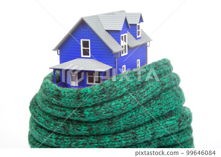 house model is insulated with a knitted scarf on a white background 99646084