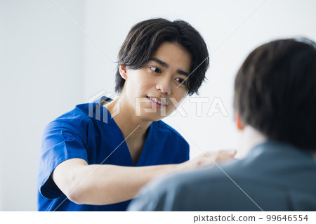 Man in scrub medical care Man in scrub medical care 99646554