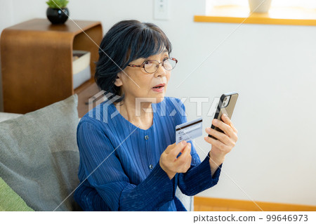 senior woman in the living room 99646973