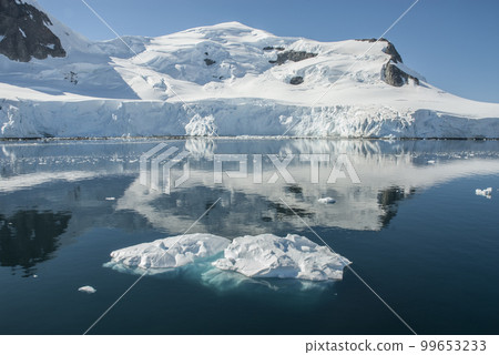Snowy mountains in Paraiso Bay, Antartica. Snowy mountains in Paraiso Bay, Antartica. 99653233