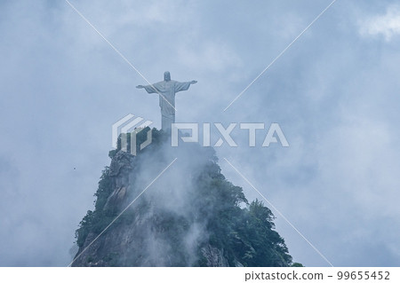View of Christ Redeemer and Corcovado Mountain at Rio de Janeiro, Brazil 99655452