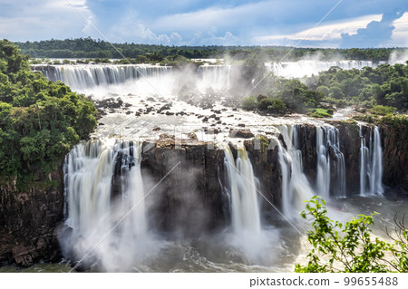 Iguazu Falls, the largest series of waterfalls of the world, located at the Brazilian and Argentinian border Iguazu Falls, the largest series of waterfalls of the world, located at the Brazilian and Argentinian border 99655488