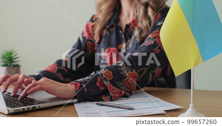 Ukranian embassy woman officer giving passport to man immigrant, student visa approval, work visa, citizenship. Visa Application online form immigration concept. Visa approval. 99657260