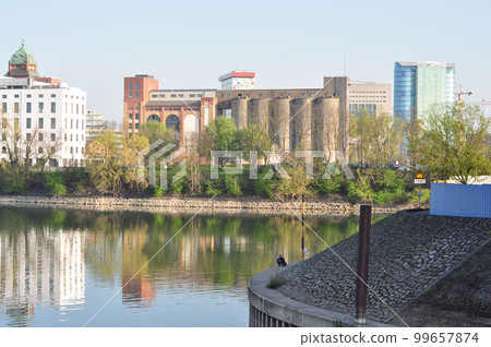 Beautiful shot of the harbor basin and old warehouse buildings in Dusseldorf, Germany Beautiful shot of the harbor basin and old warehouse buildings in Dusseldorf, Germany 99657874