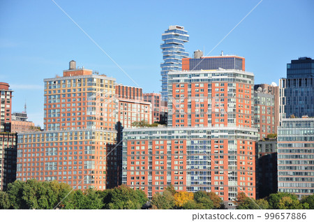 Scenic view of 56 Leonard Street skyscraper behind classic houses in New York Scenic view of 56 Leonard Street skyscraper behind classic houses in New York 99657886