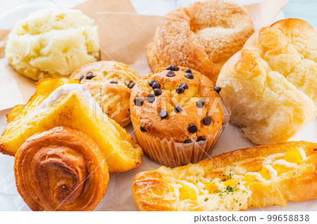 lots of bread and pastries 99658838