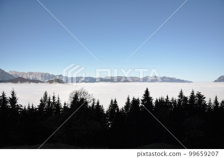 Mountains in Berchtesgadener Land, Alps in Bavaria, submerged in clouds Mountains in Berchtesgadener Land, Alps in Bavaria, submerged in clouds 99659207