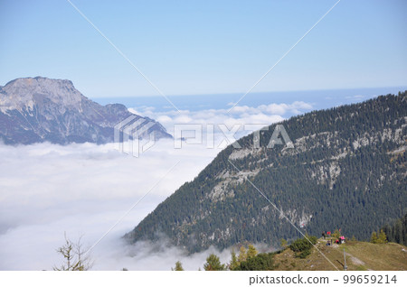 Mountains in Berchtesgadener Land, Alps in Bavaria, submerged in clouds Mountains in Berchtesgadener Land, Alps in Bavaria, submerged in clouds 99659214