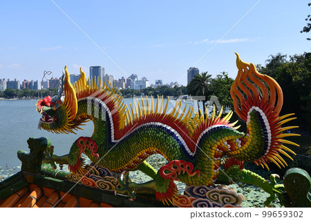 Dragon decoration on a roof of a temple at Lotus Pond in Kaohsiung, Taiwan Dragon decoration on a roof of a temple at Lotus Pond in Kaohsiung, Taiwan 99659302