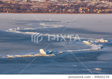 Winter sunset over the lake Balaton of Hungary Winter sunset over the lake Balaton of Hungary 99660239