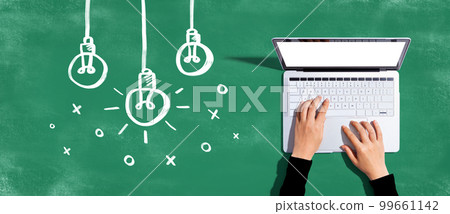 Hanging idea light bulbs with laptop computer Hanging idea light bulbs with laptop computer 99661142