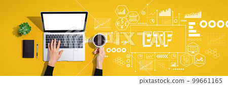 ETF theme with person using laptop computer 99661165
