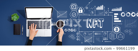NFT theme with person using laptop computer 99661199