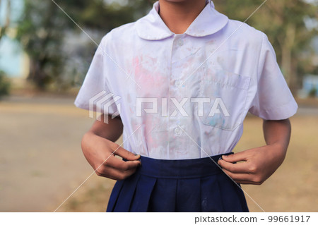dirty stain on kid shirt at part of shirt from daily life activity for cleaning concept. selective focus. dirty stain on kid shirt at part of shirt from daily life activity for cleaning concept. selective focus. 99661917