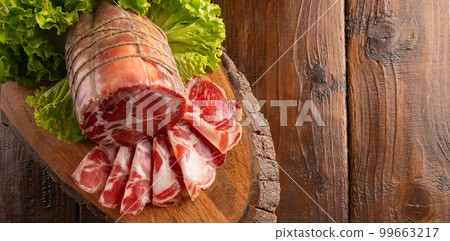 Capocollo or coppa is a traditional Italian and Corsican pork 99663217