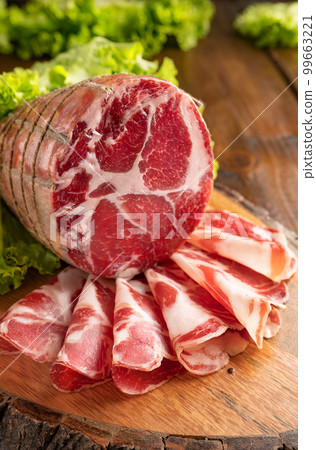 Capocollo or coppa is a traditional Italian and Corsican pork Capocollo or coppa is a traditional Italian and Corsican pork 99663221
