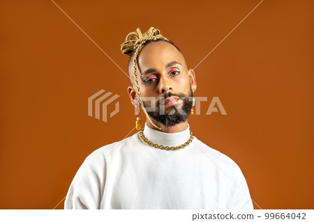 Black Gay Man with bright makeup 99664042