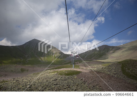 Cableway in the mountains. The landscape of the cable car of the mountains of Georgia. Cableway in the mountains. The landscape of the cable car of the mountains of Georgia. 99664661