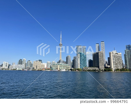 View from the ferry heading to Toronto Island, Canada (Lake Ontario, CN Tower, Downtown) View from the ferry heading to Toronto Island, Canada (Lake Ontario, CN Tower, Downtown) 99664791
