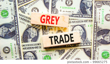 Grey trade symbol. Concept words Grey trade on wooden block. Beautiful background from dollar bills. Dollar bills. Business grey trade concept. Copy space. Grey trade symbol. Concept words Grey trade on wooden block. Beautiful background from dollar bills. Dollar bills. Business grey trade concept. Copy space. 99665275