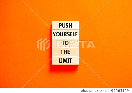 Push the limit symbol. Concept words Push yourself to the limit on wooden blocks. Beautiful orange table orange background. Business push the limit concept. Copy space. Push the limit symbol. Concept words Push yourself to the limit on wooden blocks. Beautiful orange table orange background. Business push the limit concept. Copy space. 99665339