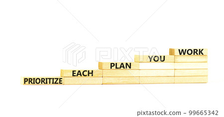 Prioritize each plan you work symbol. Concept words Prioritize each plan you work on wooden blocks on beautiful white table white background. Business prioritize each plan you work concept. Copy space Prioritize each plan you work symbol. Concept words Prioritize each plan you work on wooden blocks on beautiful white table white background. Business prioritize each plan you work concept. Copy space 99665342