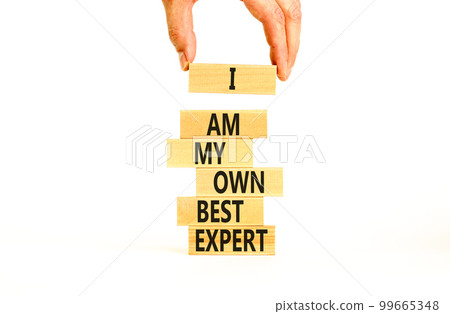 I am my own best expert symbol. Concept words I am my own best expert on wooden blocks on a beautiful white table white background. Businessman hand. Business i am my own best expert concept. I am my own best expert symbol. Concept words I am my own best expert on wooden blocks on a beautiful white table white background. Businessman hand. Business i am my own best expert concept. 99665348