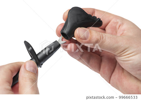 Hand with cane for Nordic walking isolated on white background. A man puts on a rubber tip or boot for use on asphalt or a hard surface close-up. Hand with cane for Nordic walking isolated on white background. A man puts on a rubber tip or boot for use on asphalt or a hard surface close-up. 99666533