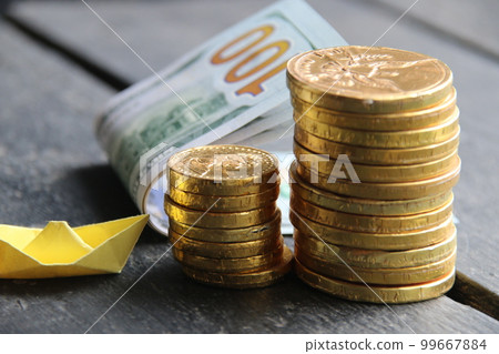 Golden coins on vintage background. Business success, money, start up concept. 99667884