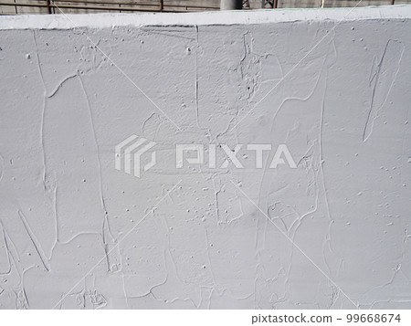 Trowel finishing for spalling prevention construction of a concrete structure (retaining wall) 99668674