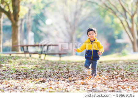 Children playing in the park 99669192