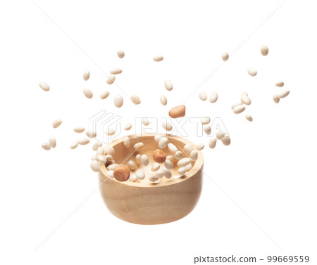 Mix white peanut beans fall down explosion, several kind bean float explode in wooden bowl. Dried white peanut mixed beans splash throwing in Air. White background Isolated high speed shutter, freeze Mix white peanut beans fall down explosion, several kind bean float explode in wooden bowl. Dried white peanut mixed beans splash throwing in Air. White background Isolated high speed shutter, freeze 99669559