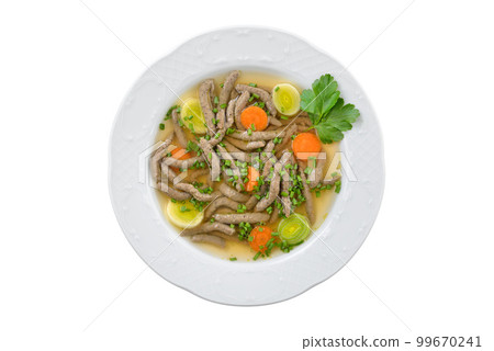 Bavarian, Swabian and Austrian dish, liver spaetzle  in a beef broth on white background 99670241