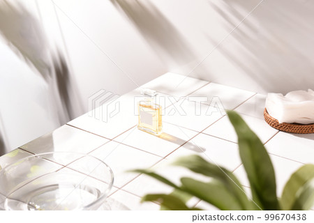 Everyday scenery with a perfume bottle 99670438