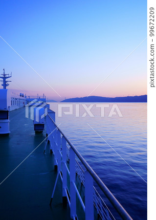 Shadow of Awaji island seen from the ferry before dawn 99672209