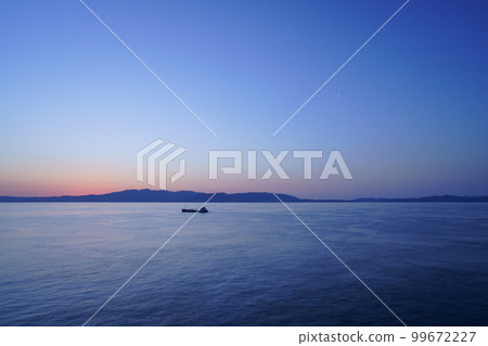Shadow of Awaji island seen from the ferry before dawn Shadow of Awaji island seen from the ferry before dawn 99672227