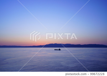 Shadow of Awaji island seen from the ferry before dawn Shadow of Awaji island seen from the ferry before dawn 99672228