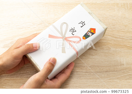 Family celebration gifts at hand Family celebration gifts at hand 99673325