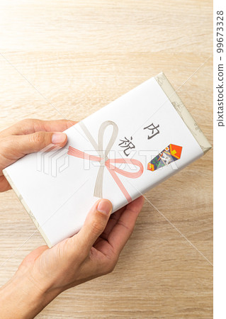 Family celebration gifts at hand Family celebration gifts at hand 99673328