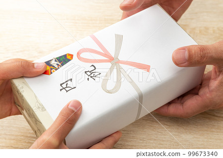Family celebration gifts at hand Family celebration gifts at hand 99673340